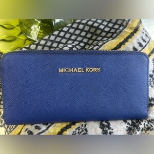 Michael Kors blue wallet.